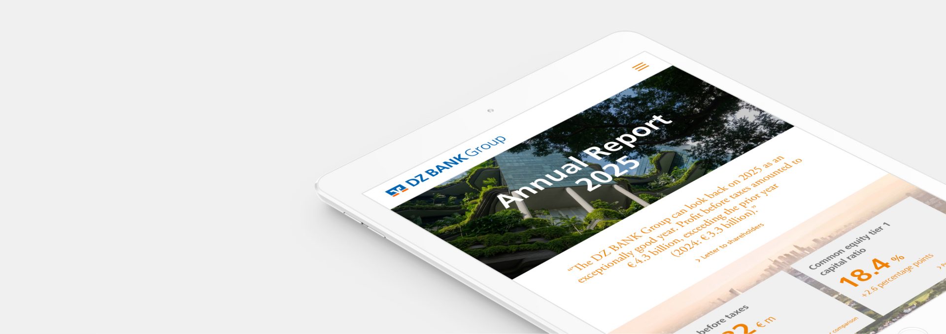 The image shows a tablet displaying a document titled "Annual Report 2023." There is text related to the report and some statistics are visible. The document includes a background image depicting trees and power lines.