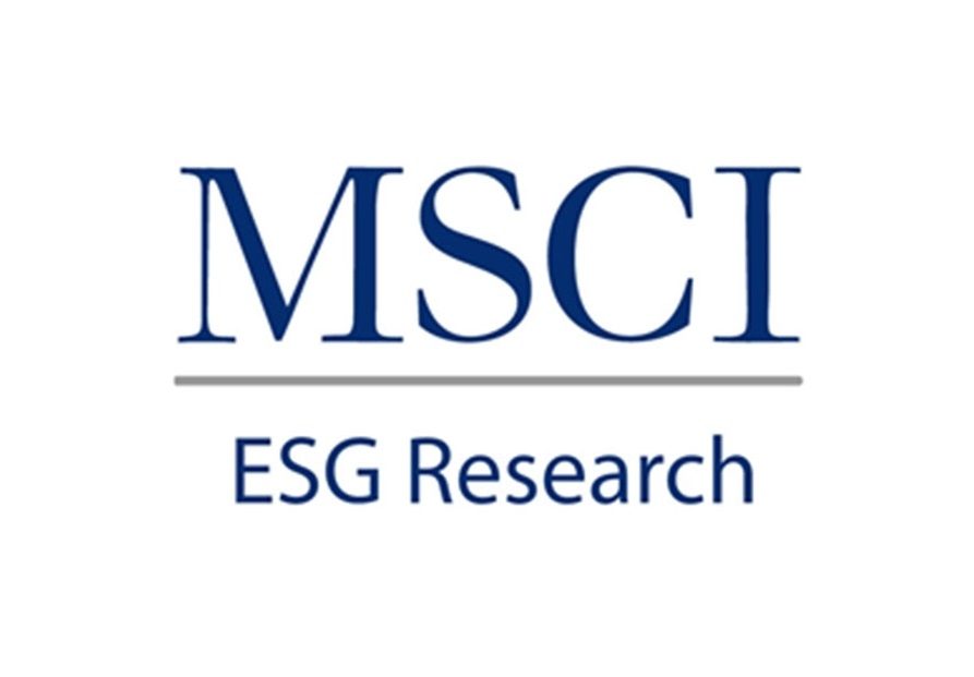 The image contains the logo of MSCI, which stands for Morgan Stanley Capital International. Below the logo name, the words "ESG Research" are displayed in a smaller font. MSCI is a global provider of financial services, specifically known for offering investors tools and data related to analysis of environmental, social, and governance (ESG) factors. The logo is primarily in shades of blue, reflecting corporate branding.