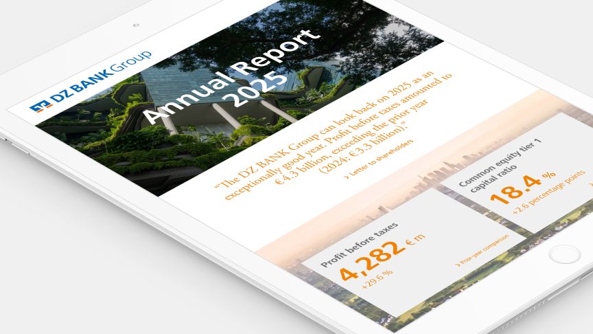 The image is of the DZ BANK Group's 2025 Annual Report displayed on a screen. It includes financial data such as profit before taxes and consumer savings, along with a quote about the bank's performance.